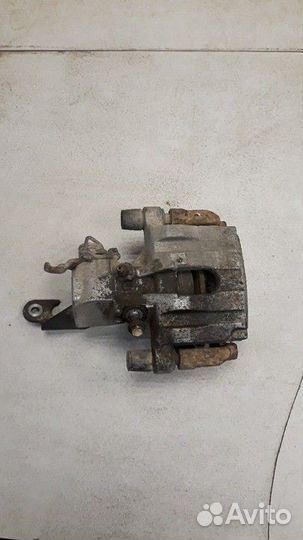 Суппорт задний правый Nissan Primera