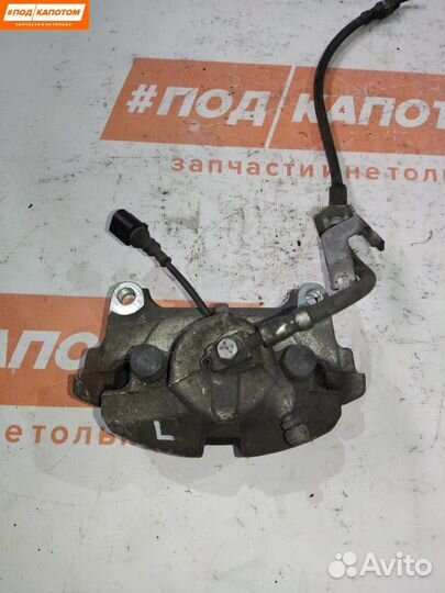 Суппорт тормозной передний левый Volkswagen