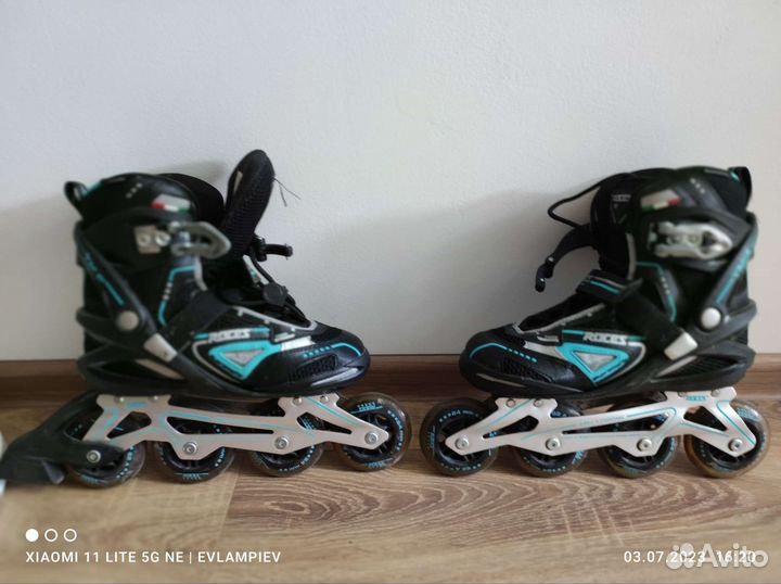 Роликовые коньки