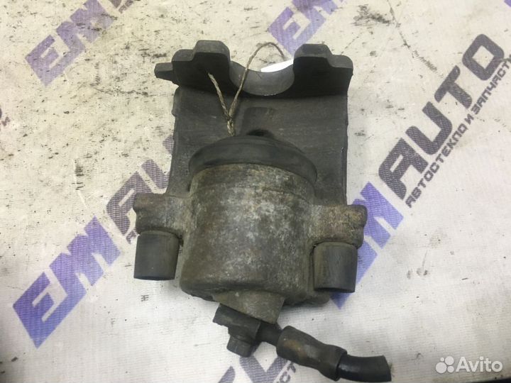 Суппорт тормозной передний левый Шкода Октавия Тур