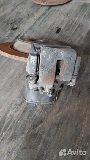 Суппорт задний в сборе с колодками Volvo