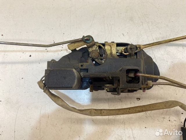 Замок боковой двери передний правый Kia Spectra