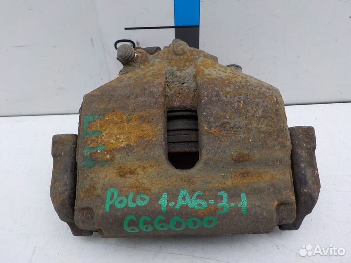 Суппорт тормозной передний левый Volkswagen Polo