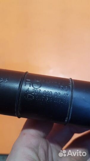 Форсунка омывателя фар правая на Mercedes W207