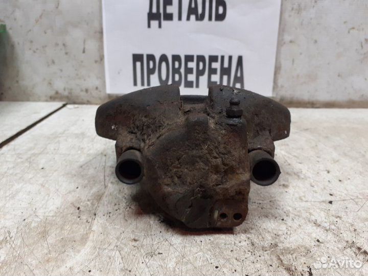 Суппорт тормозной передний правый Volkswagen