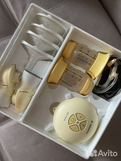 Молокоотсос medela swing maxi flex