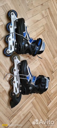 Роликовые коньки