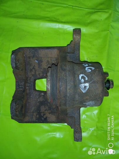 Суппорт тормозной перед правый Subaru Impreza GG2