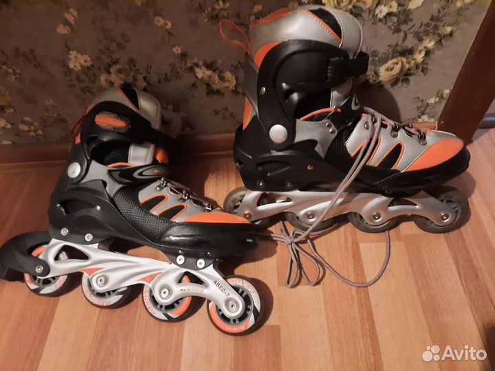 Роликовые коньки
