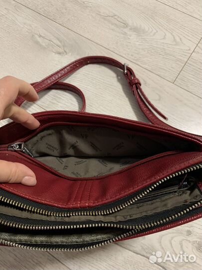 Продам кожанную сумку.Состояние новой