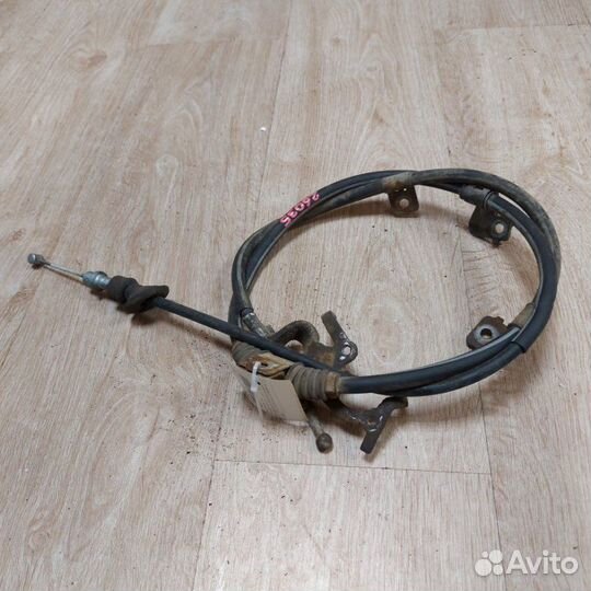 Трос ручника левый Mitsubishi Outlander 3