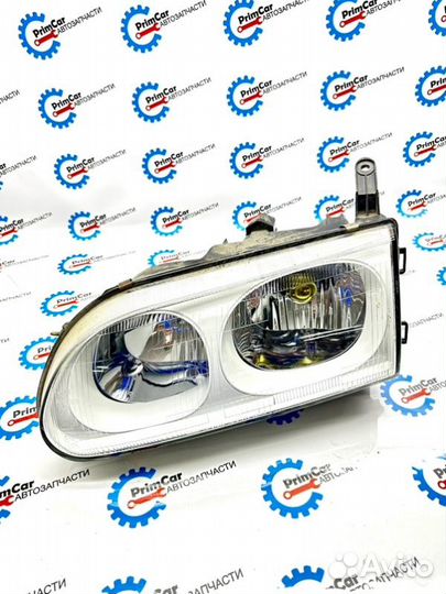 Фара левая Mitsubishi Delica PA3V