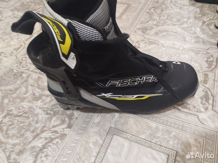 Лыжные ботинки коньковые fisher