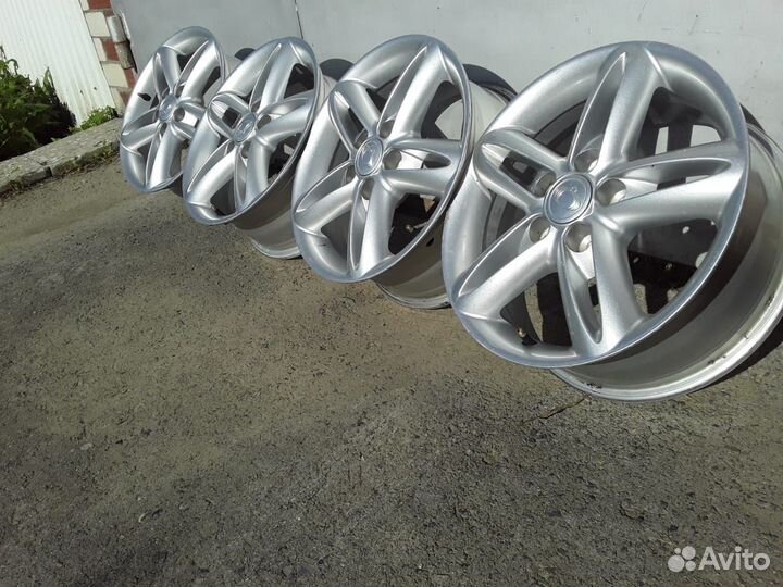 Литые диски с Санг Ёнг R 16