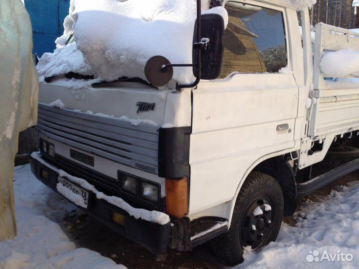 Стекло левое Mazda Titan WEL4H SL 1989