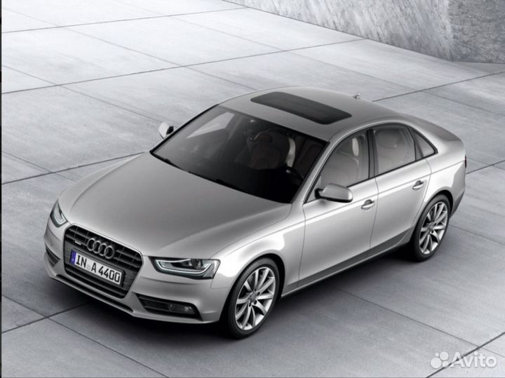 Стекло фары Audi A4 B8
