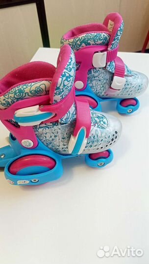 Роликовые коньки