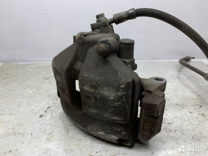 Суппорт передний левый Volkswagen Passat Cc 2.0