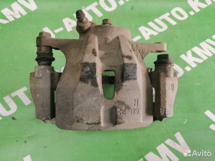 Суппорт передний правый Toyota Corolla E140