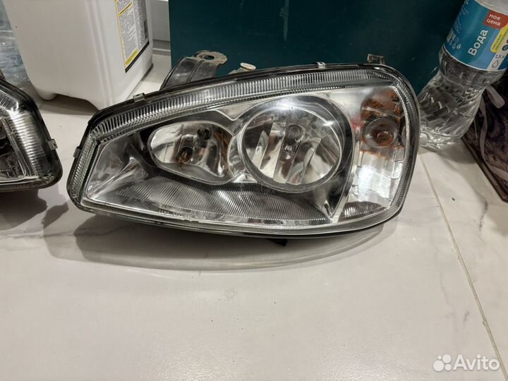 Стекло фары калина 1