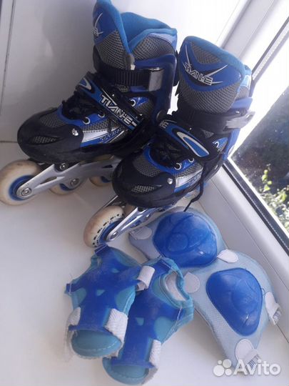 Роликовые коньки