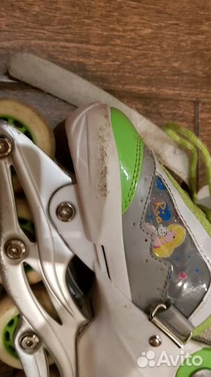 Роликовые коньки