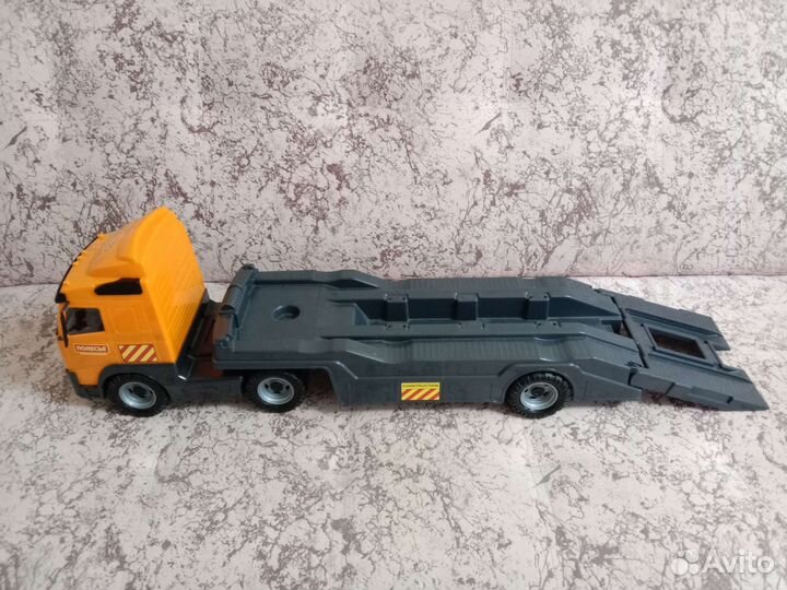 Игрушка грузовик каток