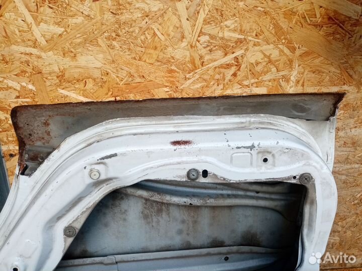 Двери задние на mazda demio