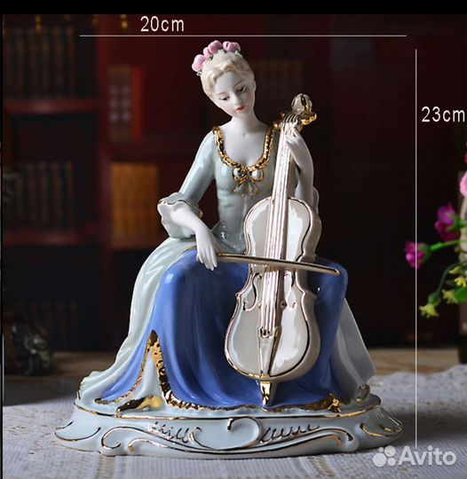 Фарфоровая статуэтка дама с виолончелью