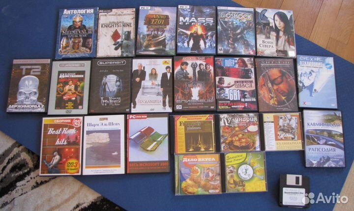 Диски DVD / CD с фильмами, играми и программами