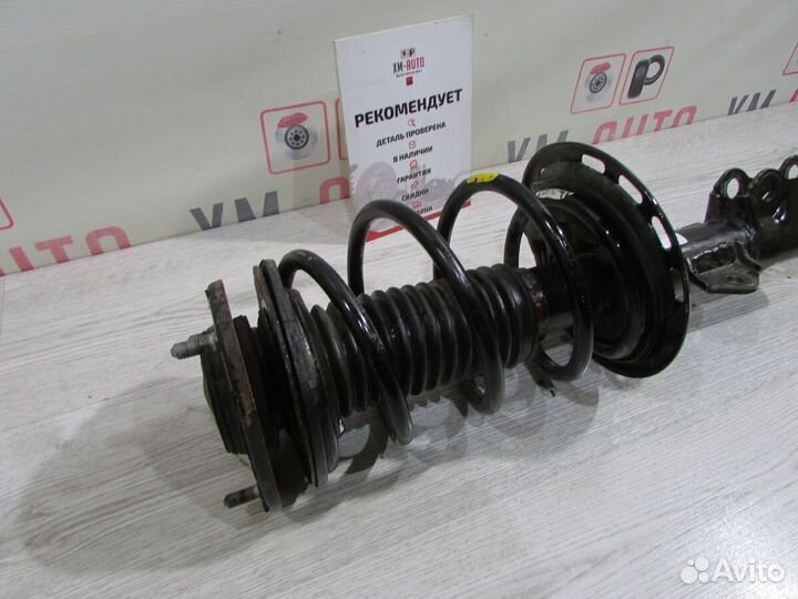 Амортизатор передний левый Toyota Corolla 150