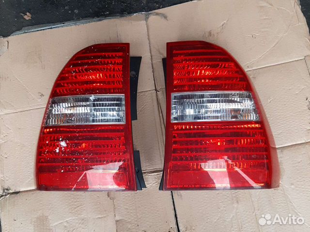 Фонарь Левый Киа Спортейдж 2 оригинал дорестал