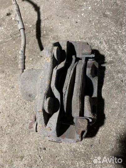 Суппорт тормозной передний правый Volkswagen Polo