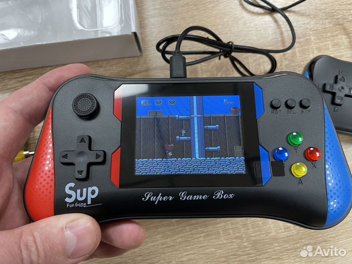 Портативная игровая приставка Sup X7M с джойстиком