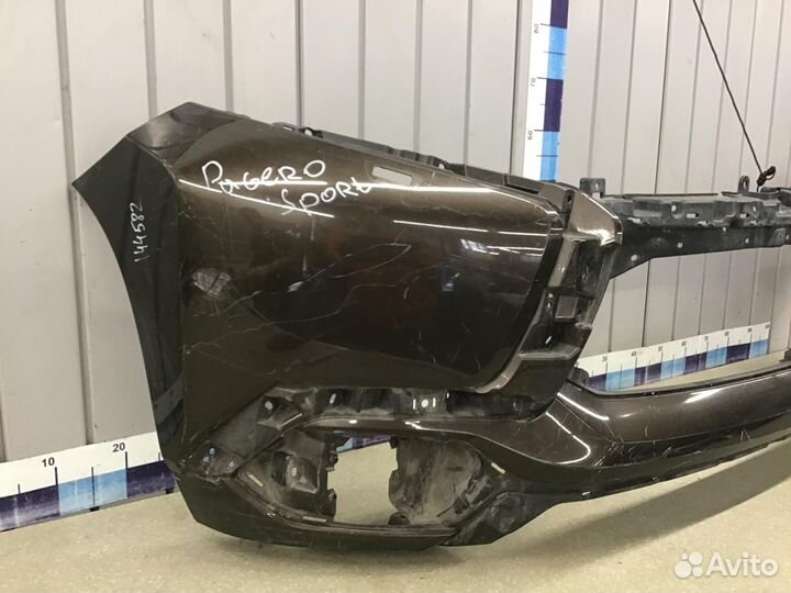 Бампер передний Mitsubishi Pajero Montero Sport (K