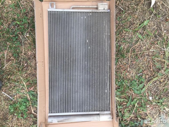 Радиатор кондиционера на Opel corsa D