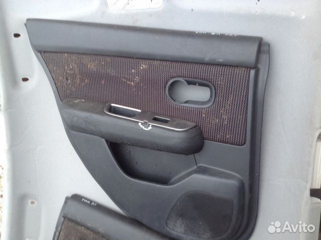 Обшивка двери Ниссан Тиида