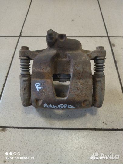 Суппорт тормозной передний правый Fiat Albea