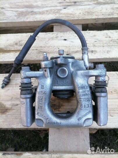 Задний левый тормозной суппорт мазда 6 GJ