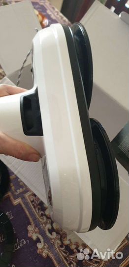 Робот для чистки стекол