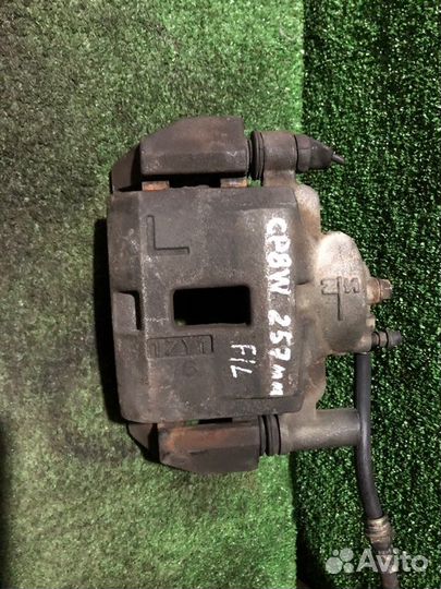 Суппорт тормозной передний левый Mazda Premacy