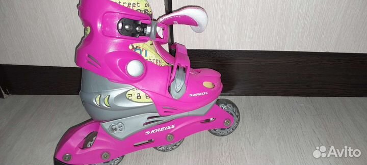 Роликовые коньки