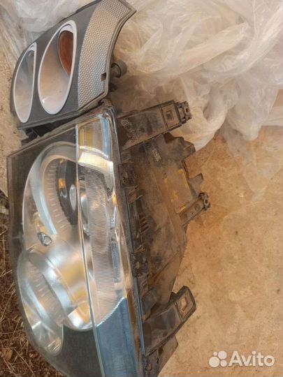 Фары на range rover 2003