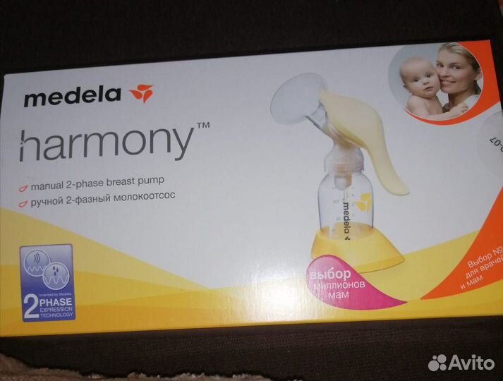 Молокоотсос Medela