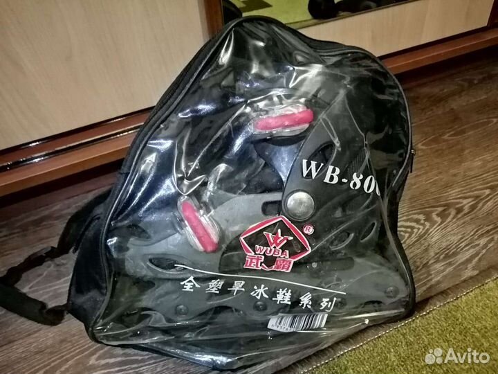 Роликовые коньки