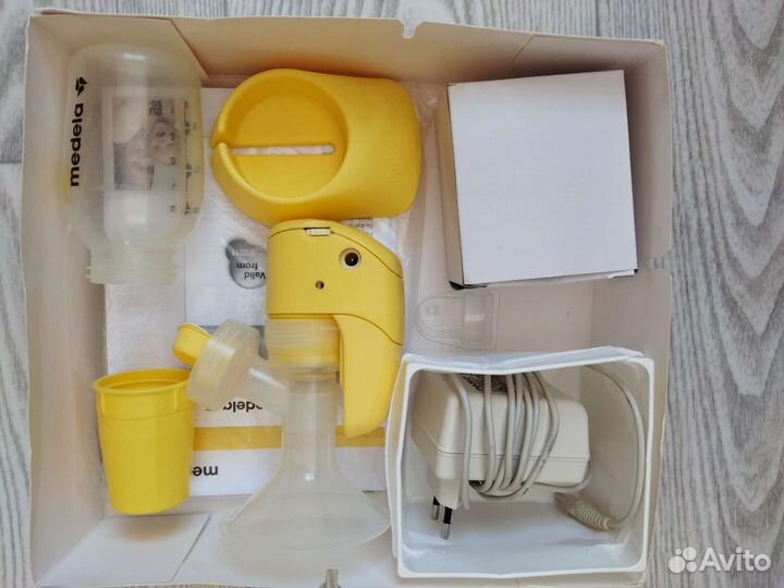 Молокоотсос medela mini electric