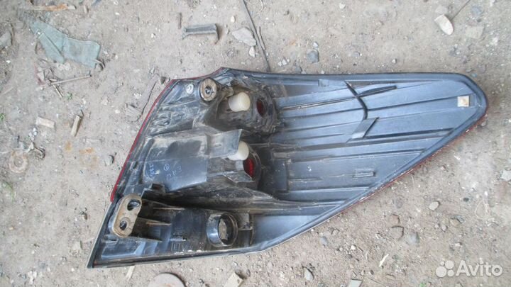 Фонарь задний левый Subaru Legacy Outback