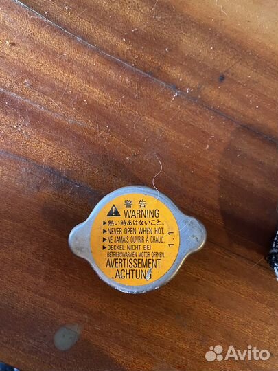 Крышка радиатора лансер 9