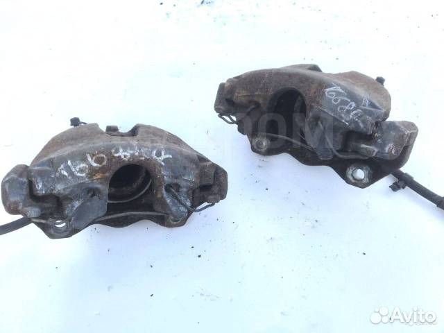 Суппорт передний левый Opel Astra H