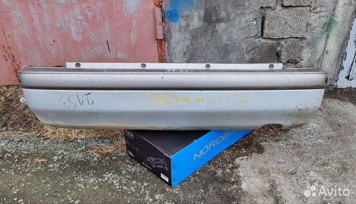 Задний бампер carina